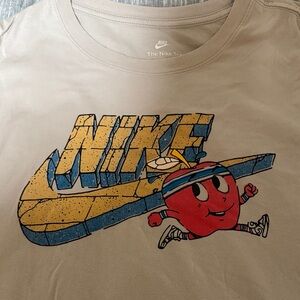 Nike Beige Tee with Cartoon Graphic